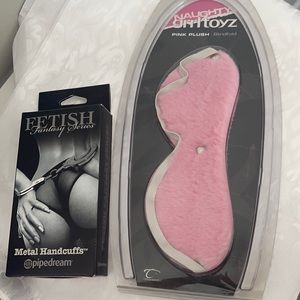 Metal Handcuffs and Pink Blindfold
